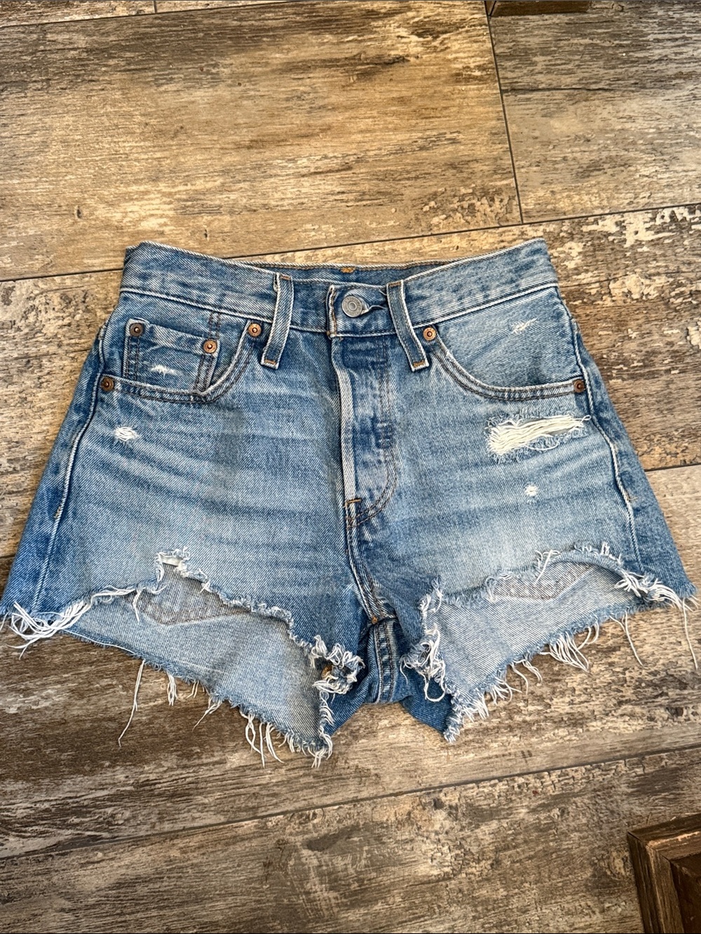 Levi's 501 Light Blue Distressed High-Rise Jean Shorts